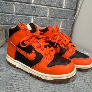 Size 4Y / Nike Orange and Black High-Top Sneakers